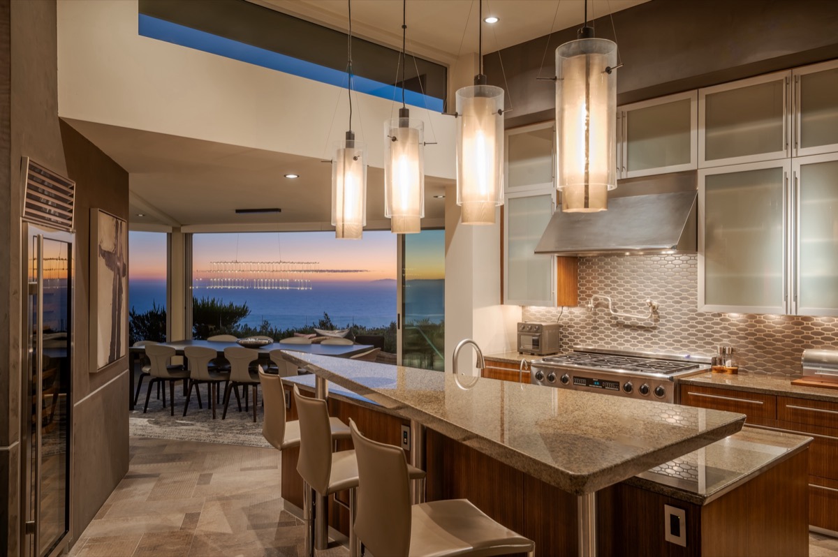 Kitchen with island seating and pendant lighting